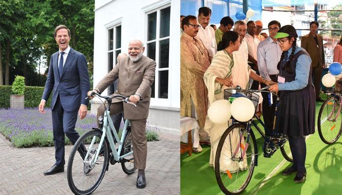 নরেন্দ্র মোদীকে সাইকেলে চড়ালেন ডাচ প্রধানমন্ত্রী নরেন্দ্র মোদীকে সাইকেলে চড়ালেন ডাচ প্রধানমন্ত্রী