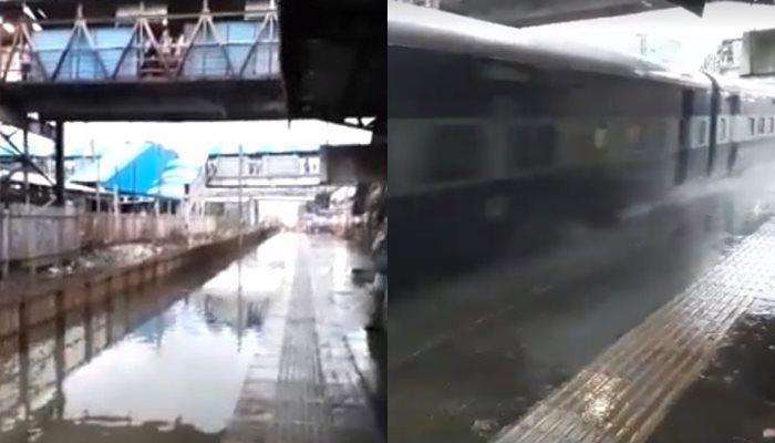 জলে ভাসছে রেললাইন, তারমধ্যেই চলছে ট্রেন, ভাইরাল ভিডিও জলে ভাসছে রেললাইন, তারমধ্যেই চলছে ট্রেন, ভাইরাল ভিডিও