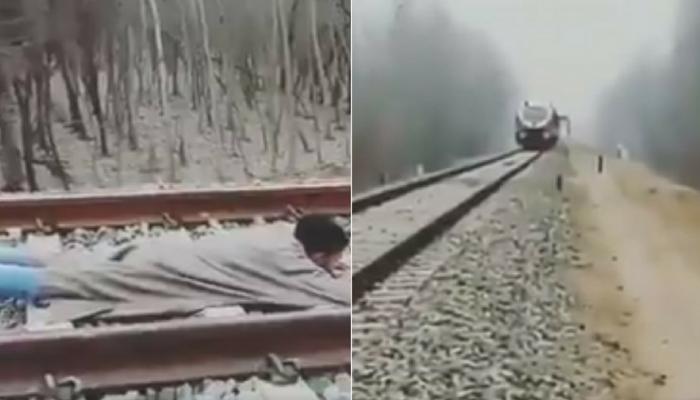 ট্রেনের সামনে শুয়ে পড়লেন কাশ্মীরি যুবক, ভাইরাল হল ভিডিও ট্রেনের সামনে শুয়ে পড়লেন কাশ্মীরি যুবক, ভাইরাল হল ভিডিও